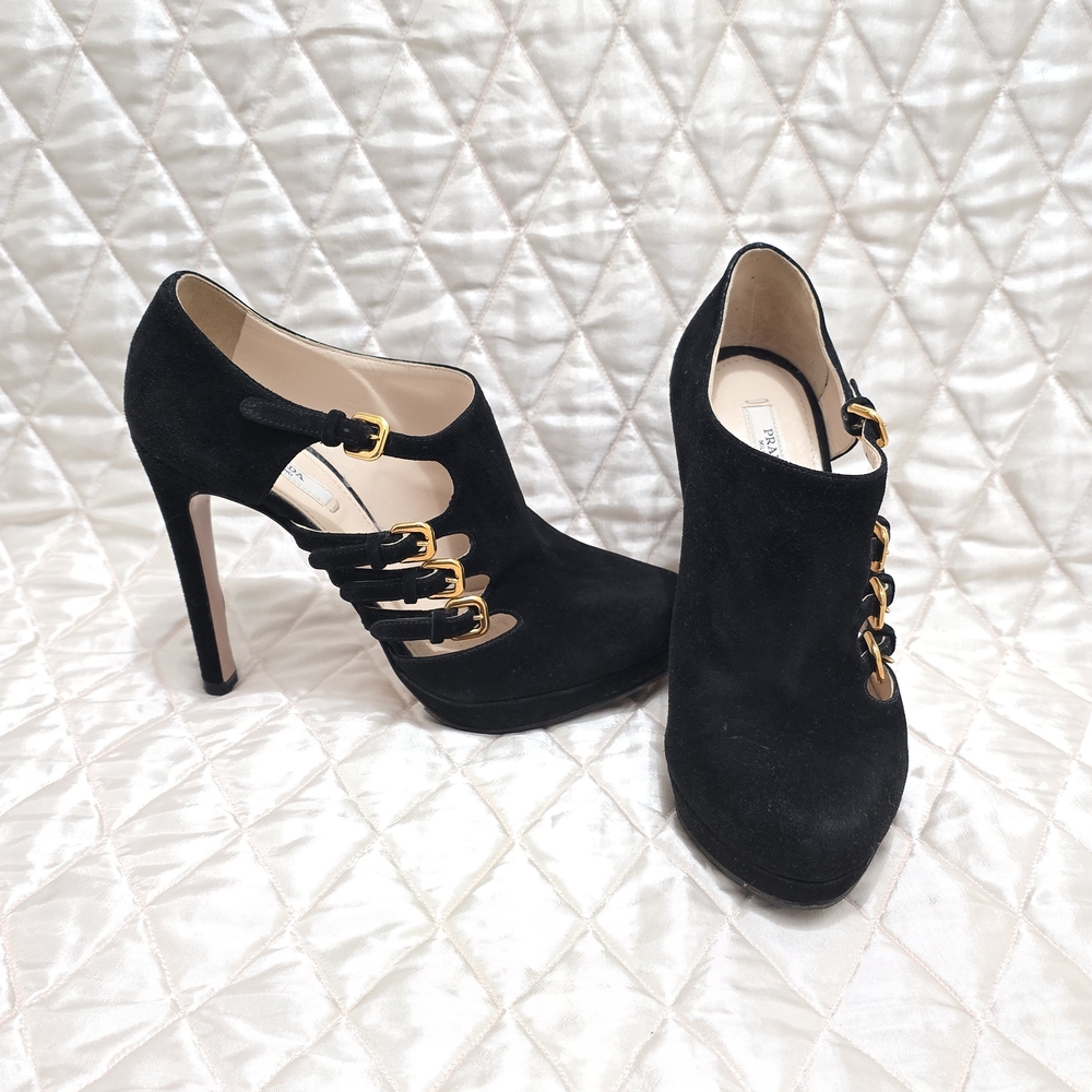 Prada Elegant Black Heels with Gold Buckles